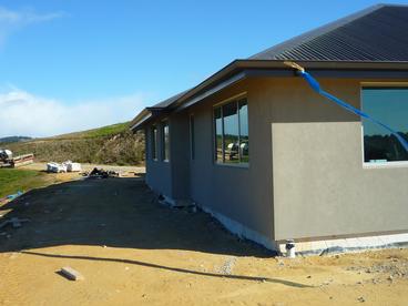  Stucco cladding over AAC concrete panel and cedar features (08.08.2014) 